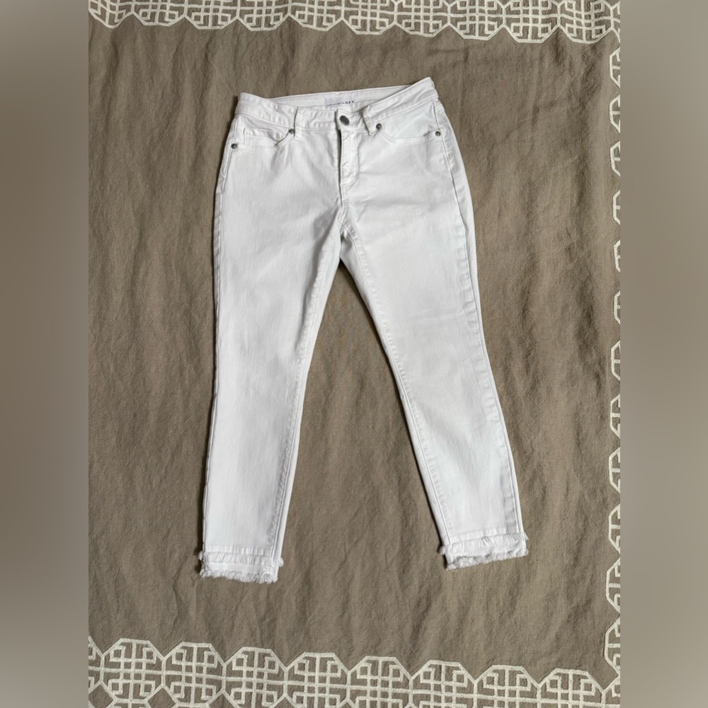 Women’s LOFT frayed high rise skinny jeans.